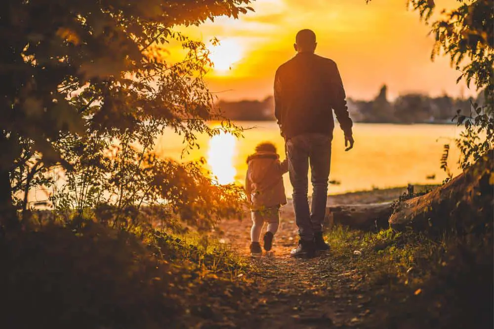 Father and child going for a walk