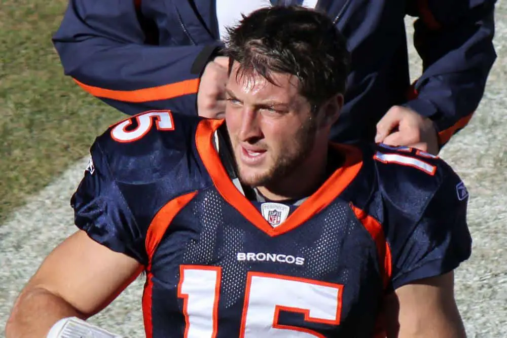 Tim Tebow leaving the field after practice