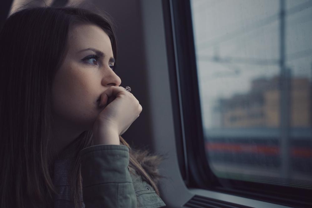 Woman looking out the window