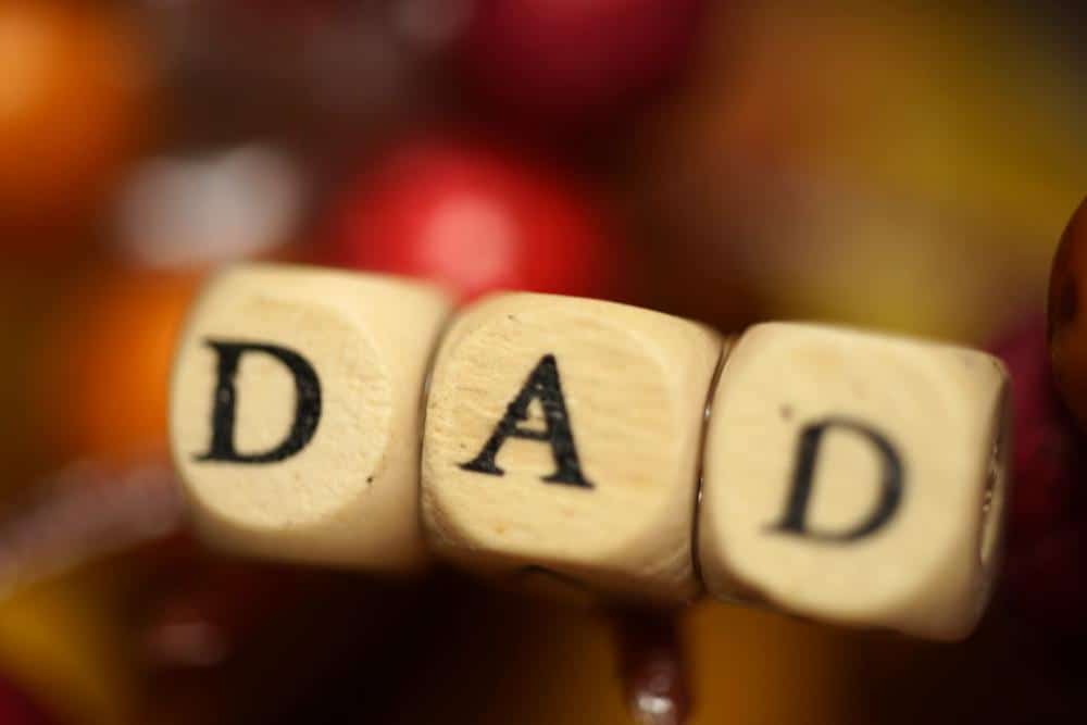 dad written with wooden squares
