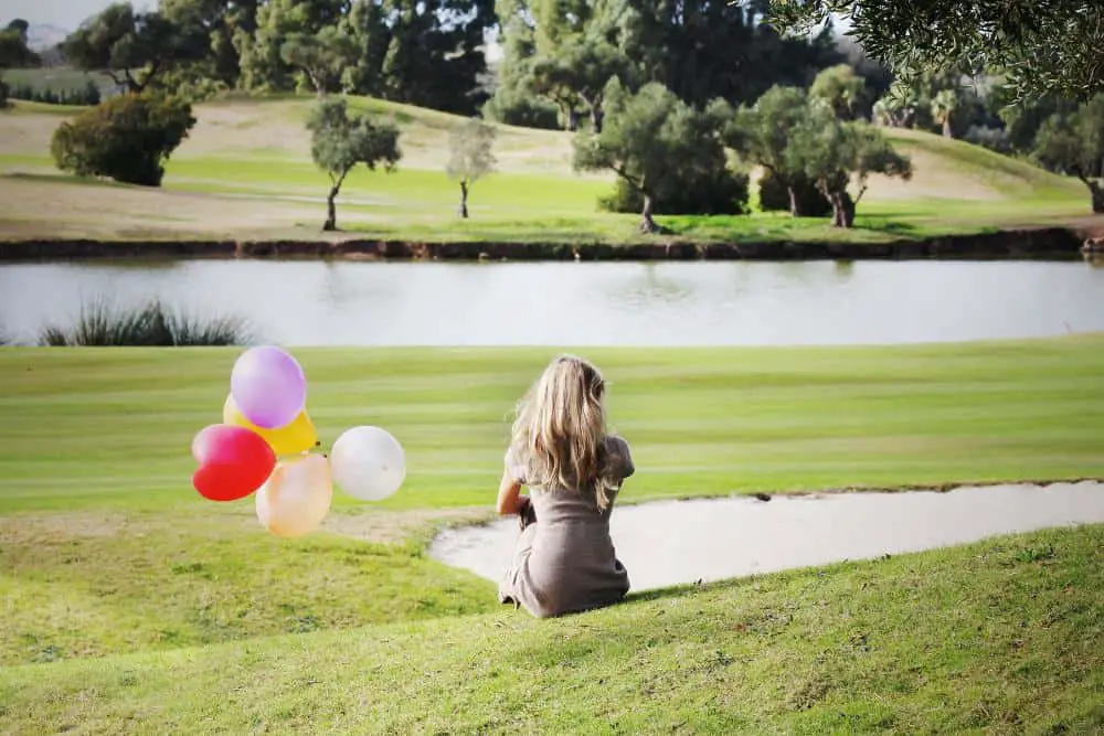 A single woman enjoying happily in the park