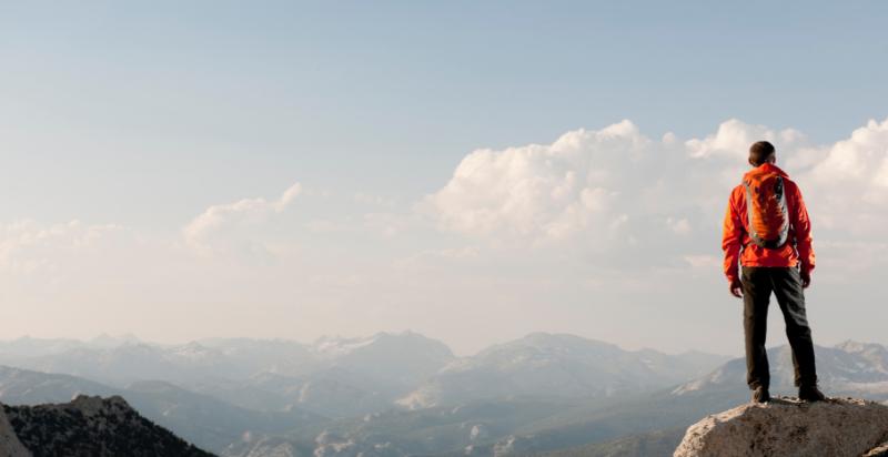 A man standing on a precipice