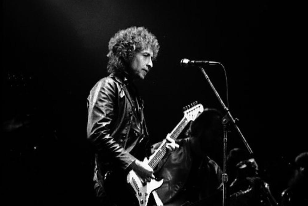 Bob Dylan performing on stage